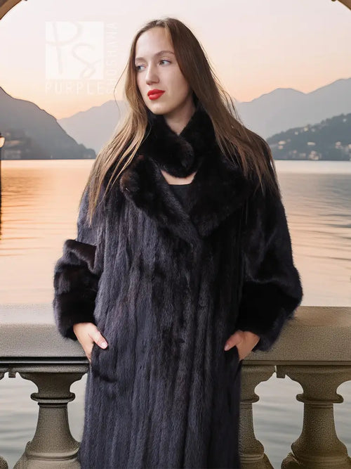 Black mink coat with sculpted collar and wide sleeves, long hem, side view