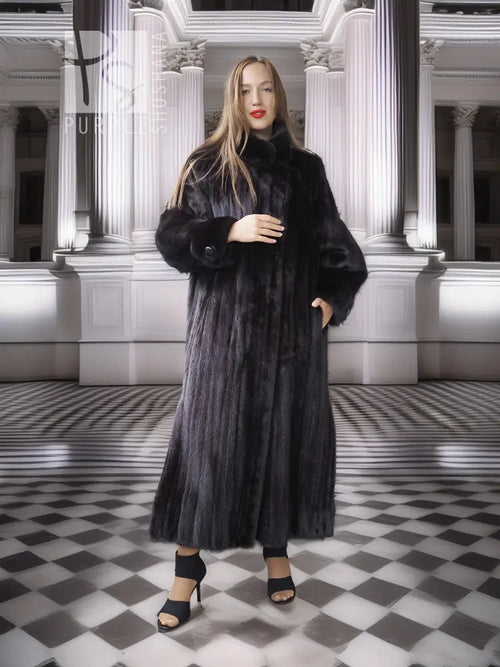 Black mink coat with sculpted collar, long sleeves, full length, dramatic drape