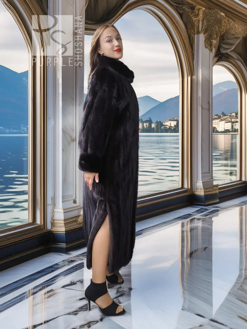 Black mink coat with sculpted collar, long hem, side profile stance
