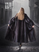 Black mink coat back view, dramatic sweep and wide sleeves, long A-line hem
