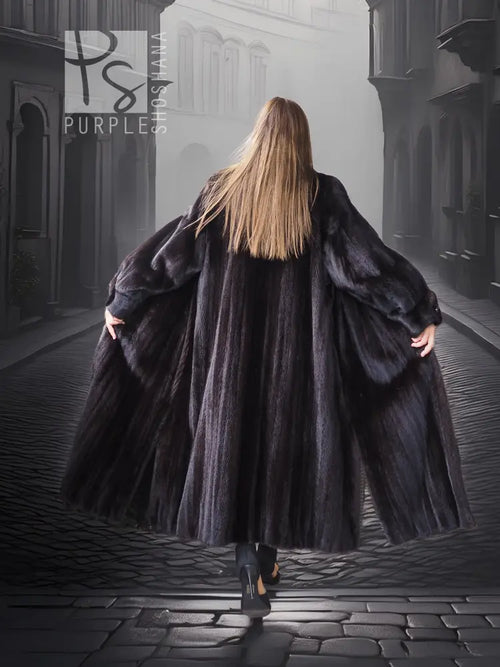 Black mink coat back view, dramatic sweep and wide sleeves, long A-line hem