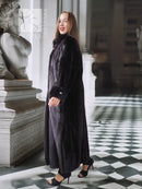 Black mink coat with sculpted collar and long, straight profile