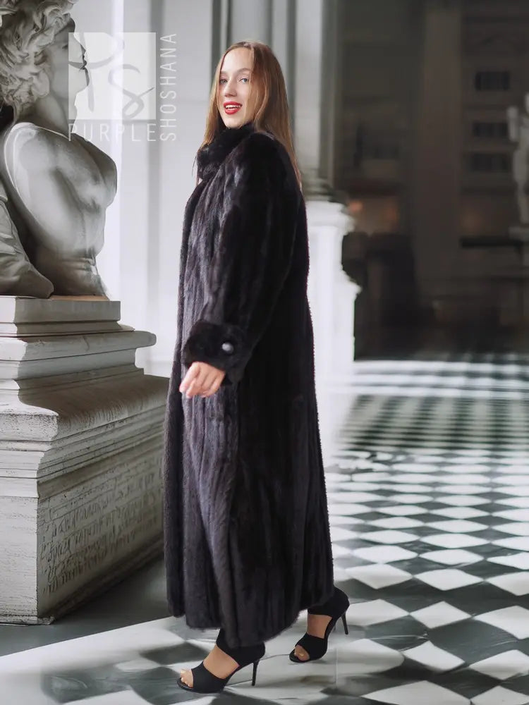 Black mink coat with sculpted collar and long, straight profile