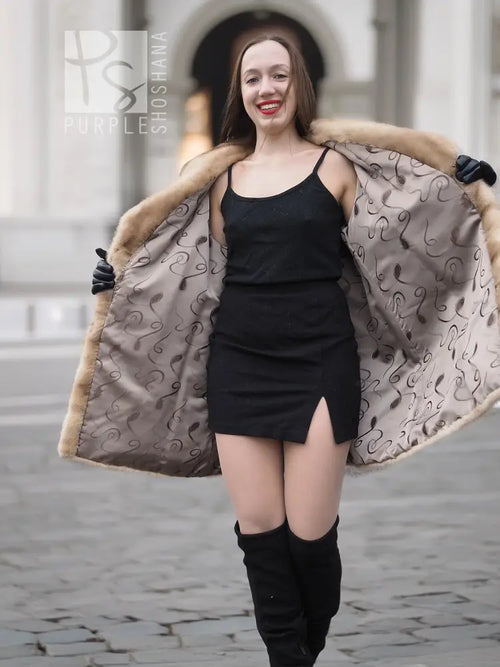 Pastel mink fur stroller jacket, oversized collar and long sleeves with black cuffs