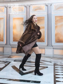 Dark brown fur swing coat with hood, short hem flare, and black boots.