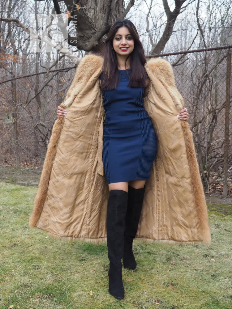 Tanuki raccoon fur coat with hood and open front, tan fur, full-body view with hands at sides.