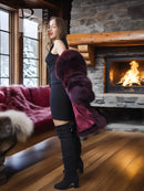 Burgundy fox fur stroller-length jacket, back-right view with thick draped fur