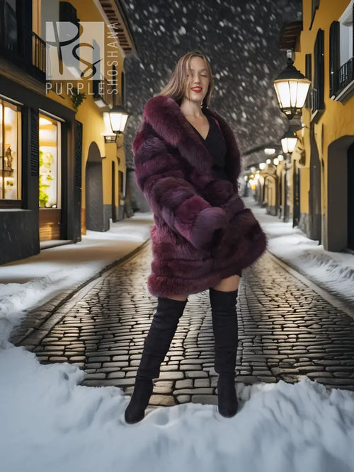 Burgundy fox fur stroller-length jacket, standing front view with layered fur volume