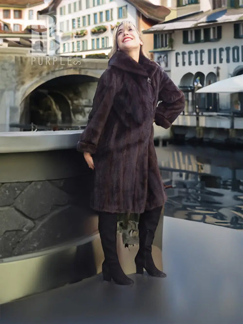 Dark mink fur hooded coat with mid-thigh length and button at neckline