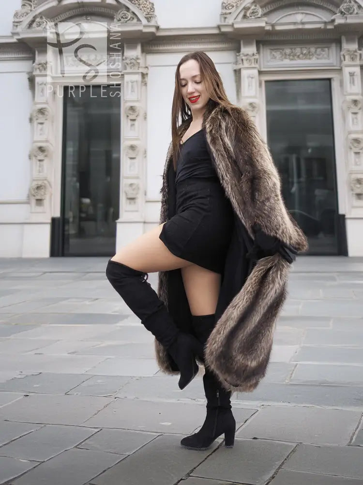 Raccoon fur coat with scalloped hem, draped shoulders, side pose
