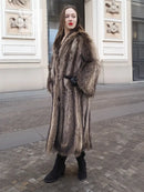 Raccoon fur coat with scalloped hem, belted look at waist, front full length