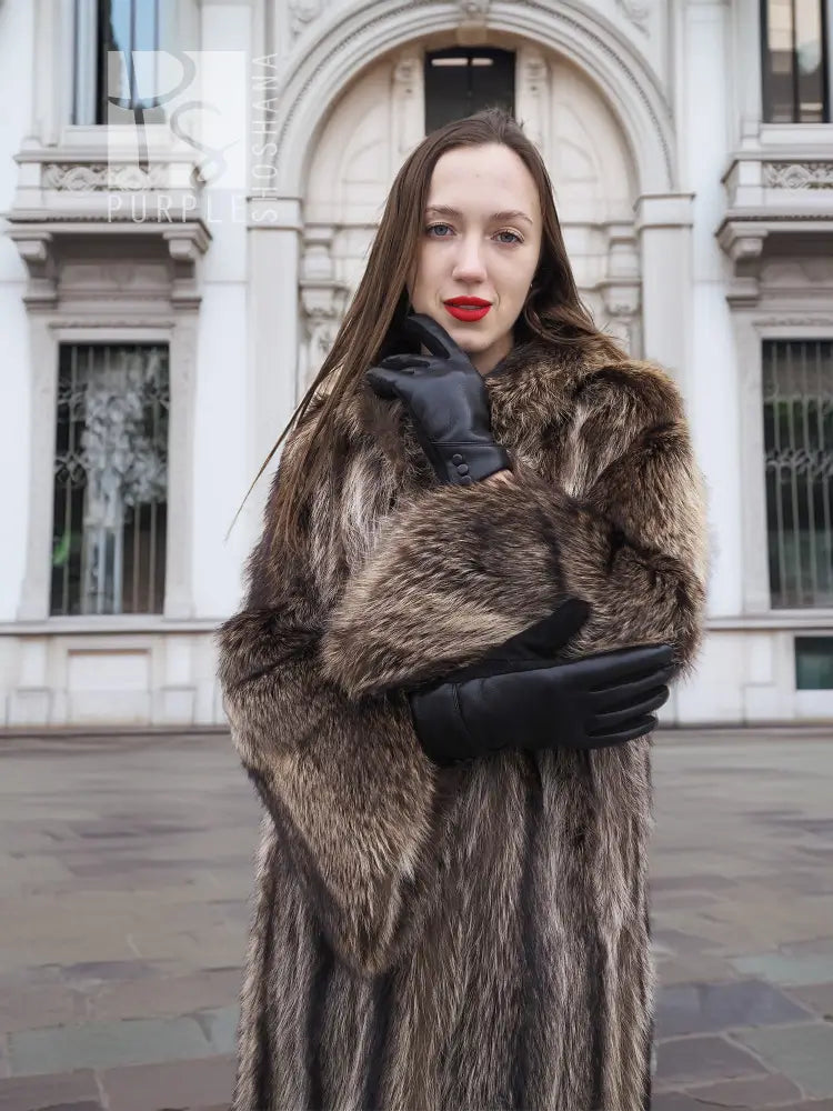 Dark brown raccoon fur coat with fur collar and black gloves, front close-up