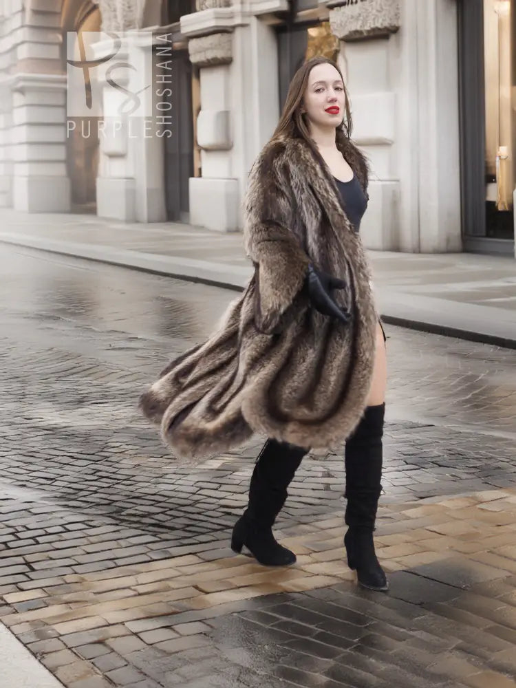 Long raccoon fur coat with scalloped hem, open front over black dress, side stance