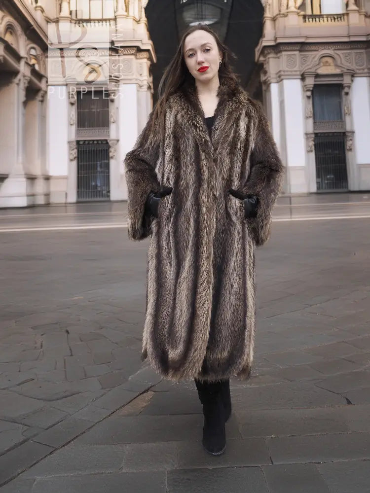 Front view of dark brown raccoon fur coat with full skirt and long length