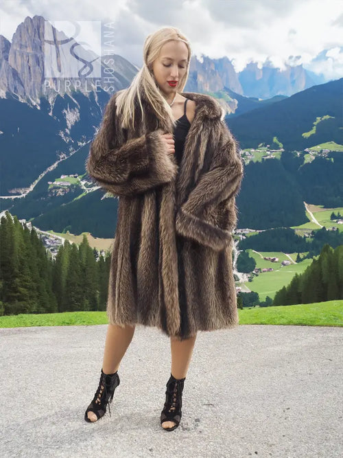 Raccoon fur coat with detachable hood, dark brown, front view with wide fur collar