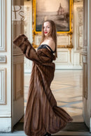 Brown mink fur coat with open front and rounded collar button detail