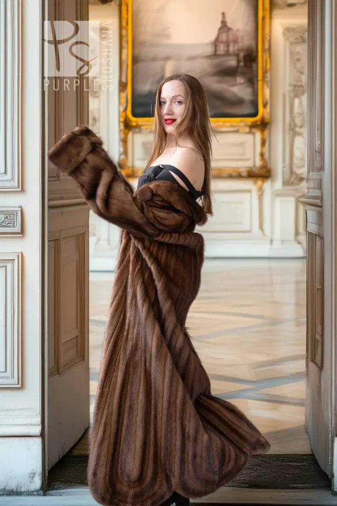 Brown mink fur coat with open front and rounded collar button detail