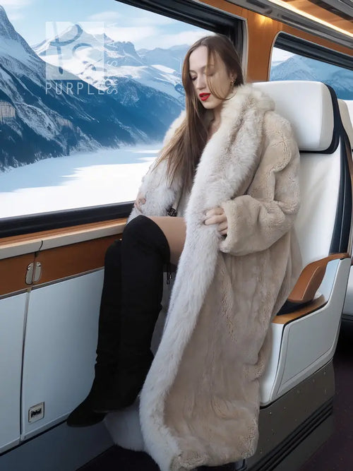 Long champagne fur coat with soft collar and draped, full-length silhouette