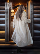 Sheared beaver fur coat with fox trim, light champagne, side view while standing