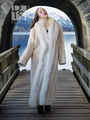 Long champagne fur coat standing on walkway, relaxed fit and wide sleeves