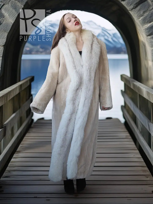 Long champagne fur coat standing on walkway, relaxed fit and wide sleeves