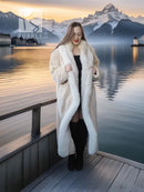 Long hooded fur coat, light cream, open front over black top and boots