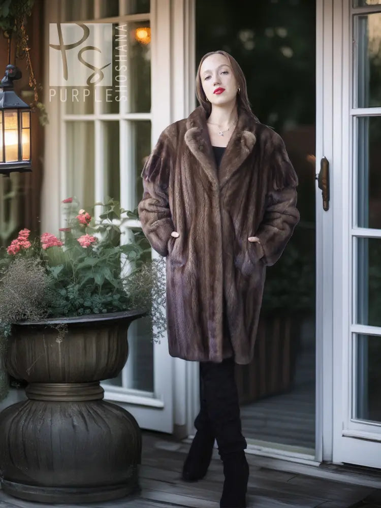 Mink fur coat in dark brown, knee-length with wide collar and structured shoulders