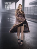 Brown mink fur coat with high stand collar and mid-length silhouette