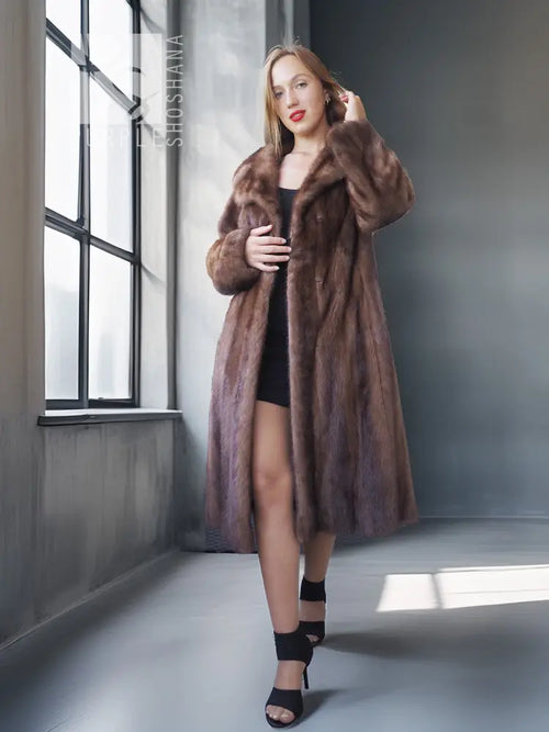 Demi buff mink fur coat with stand collar, midi length, brown, worn with black shoes
