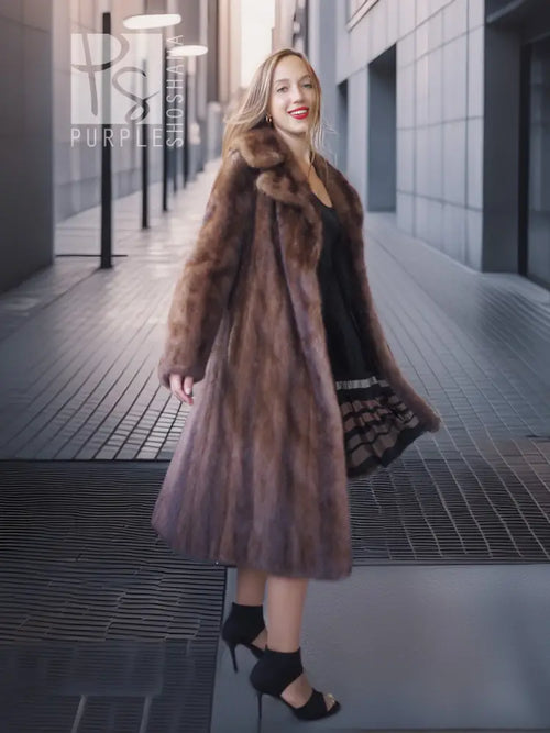 Brown mink fur coat with high stand collar, swing hem and front fit