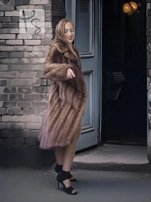 Brown mink fur coat with high stand collar, side view with flared hem