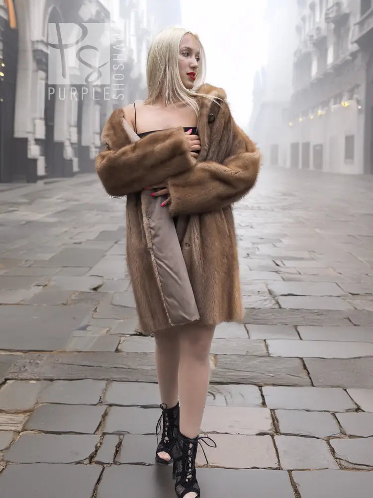 Pastel brown mink fur coat with hood, open front, long sleeves, relaxed fit