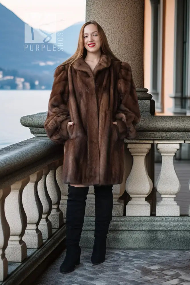 Brown mink fur jacket with stand-up collar and long sleeves, front view