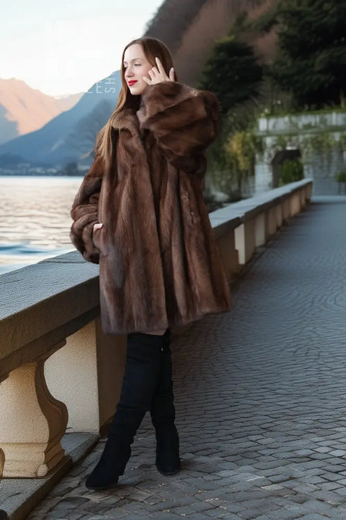 Brown mink fur jacket with structured fur panels and thick collar