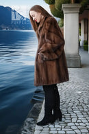 Brown mink fur jacket with long length and layered fur front detail