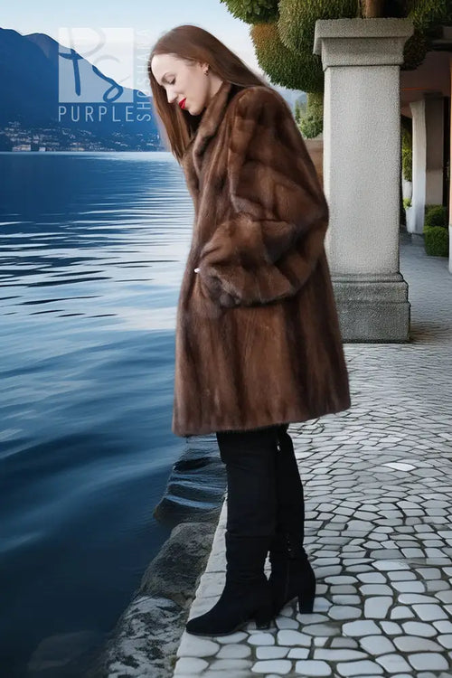Brown mink fur jacket with long length and layered fur front detail