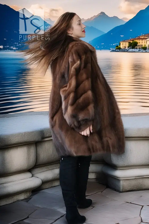 Brown mink fur jacket with rich brown fur, side profile pose on balcony