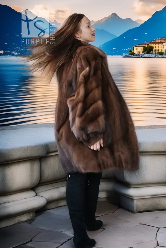 Brown mink fur jacket with rich brown fur, side profile pose on balcony