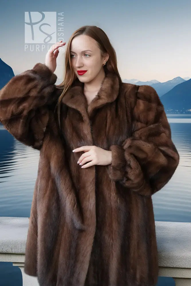 Brown mink fur jacket with plush turn-back collar and textured fur panels