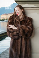 Brown mink fur jacket with plush fur collar and cuffed sleeves in rich dark brown
