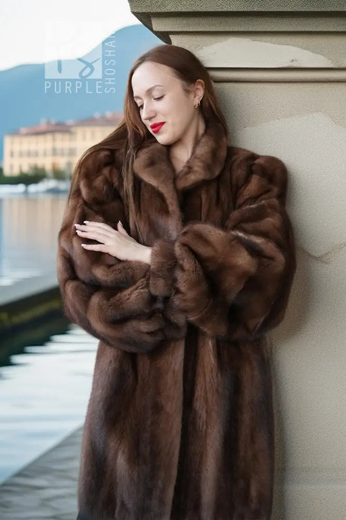 Brown mink fur jacket with plush fur collar and cuffed sleeves in rich dark brown