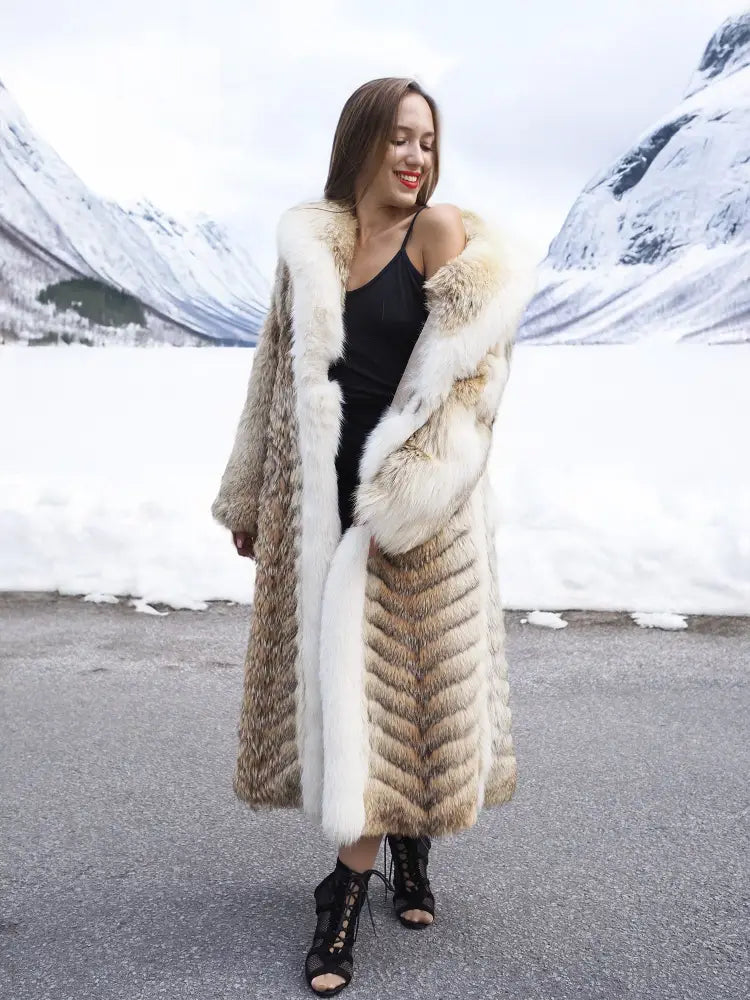 Coyote fur coat with white fox trim shawl collar, long length, angled front view