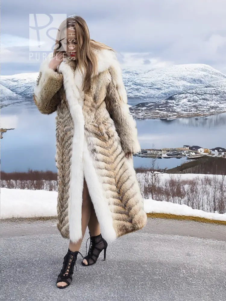 Coyote fur coat with white fox trim, long open front and draped shawl collar
