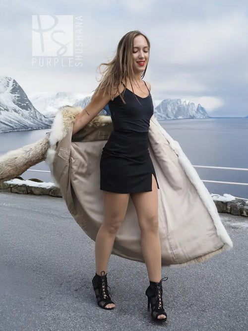 Coyote fur coat with white fox trim, shawl collar, open front with draped side panels