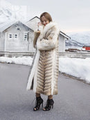 Long coyote fur coat with white fox shawl collar and open front, full-length sleeves
