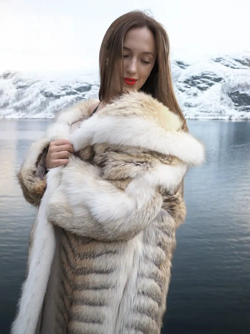 Coyote fur coat with white fox trim, shawl collar, close-up of light tan fur texture