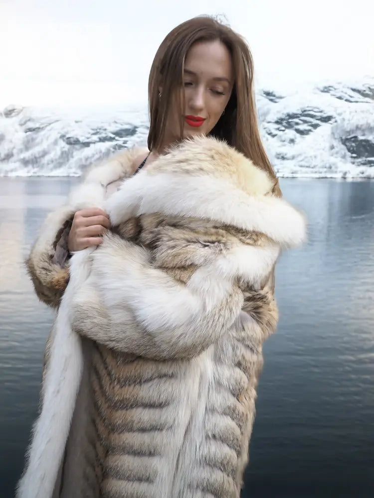 Coyote fur coat with white fox trim, shawl collar, close-up of light tan fur texture