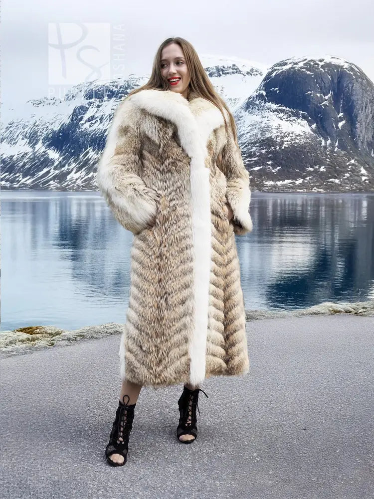 Long coyote fur coat with white fox shawl collar, open front and vertical textured stripes