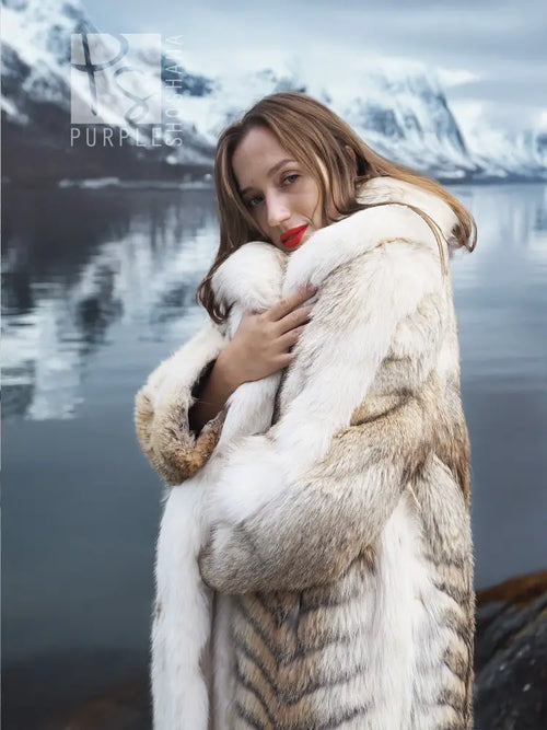 Coyote fur coat with white fox trim shawl collar, wrap-style front, long sleeves