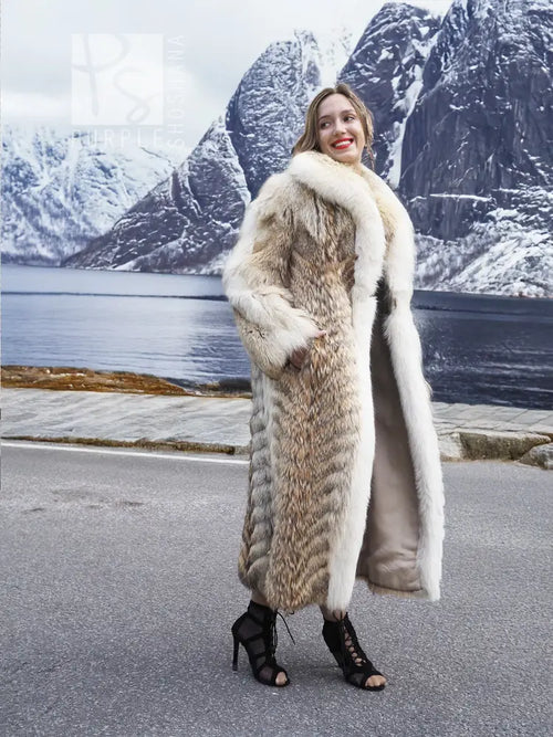 Coyote fur coat with white fox trim shawl collar, long sleeves, open front drape